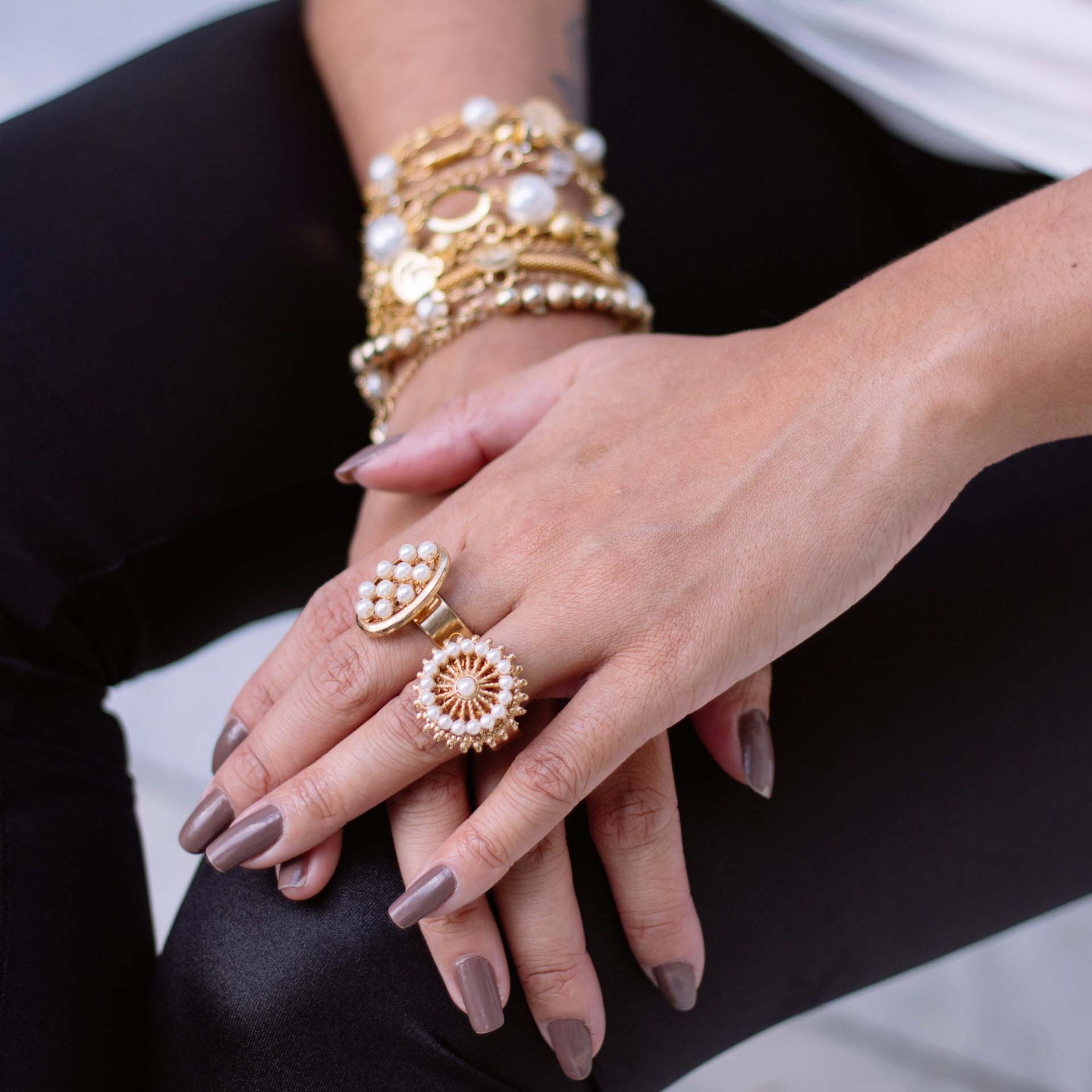 Womans hands with rings and bracelets